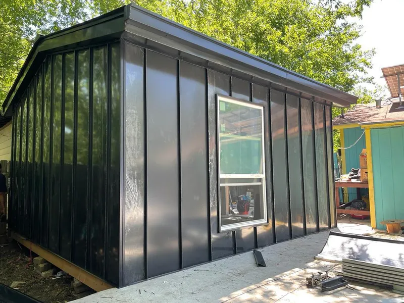 Black standing seam metal wall panels for Roof Inspection in Yucca Valley