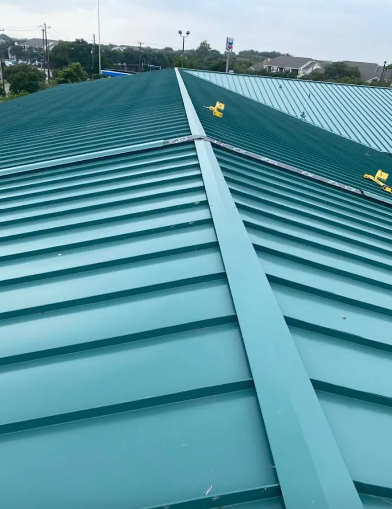 Green commercial metal roof ridge and valley for Metal Roof Repair in Yucca Valley